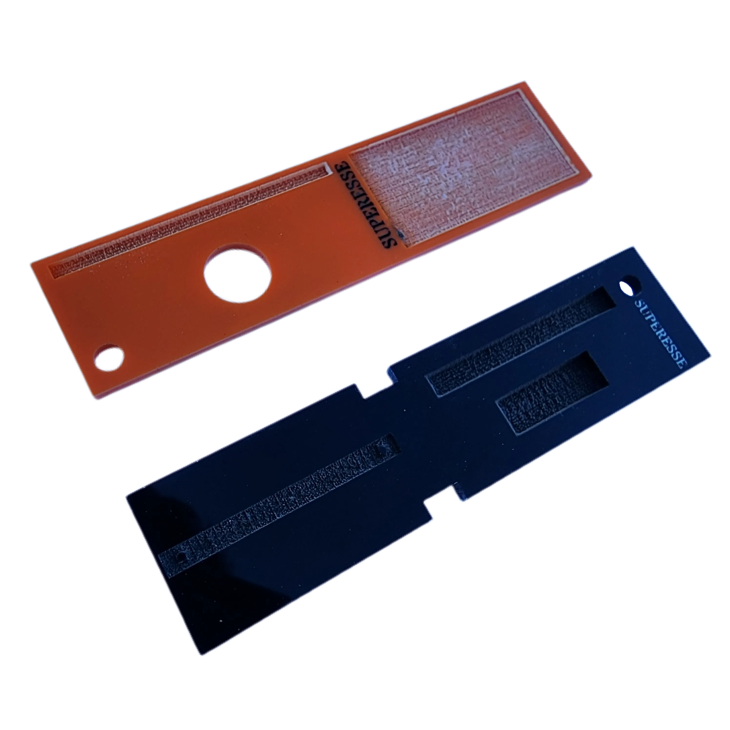 Partitioned Kit & Reference - Bar (PKR Bar): Keychain with compartmentalized storage areas for supplies and quick reference data engraved on backing.